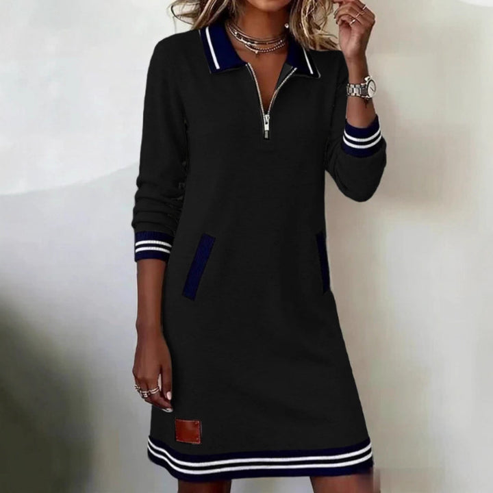 Women's polo dress in a sporty look with decorative zipper and side pockets Skjora