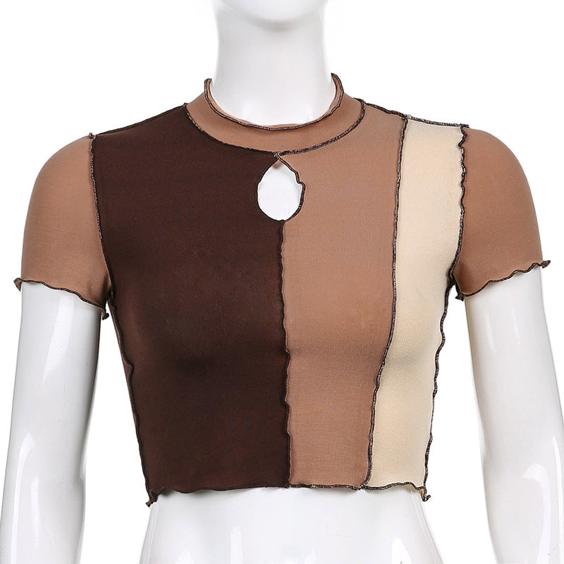 Dame cropped T-skjorte med unikt cut-out-design og kontrastsømmer Skjora