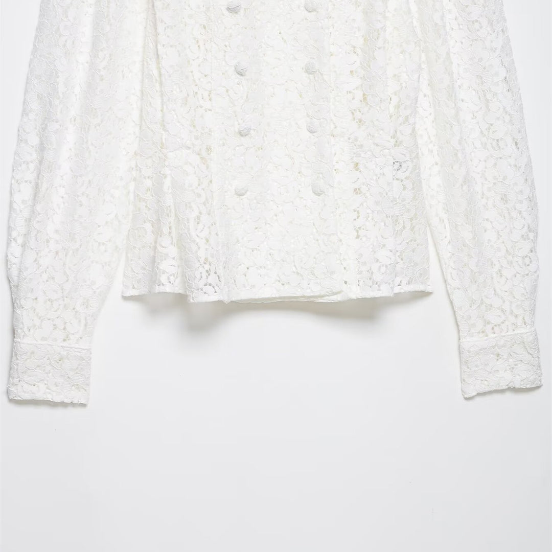 Dame spissbluse med dekorative knapper og elegant passform Skjora