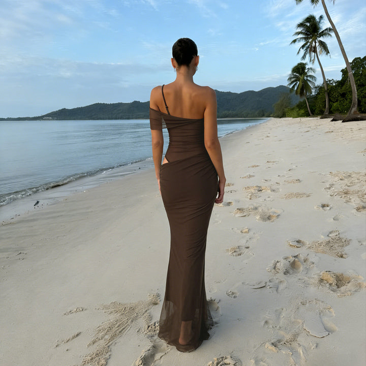 Elegant women's evening dress with refined ruffle details and transparent inserts Skjora