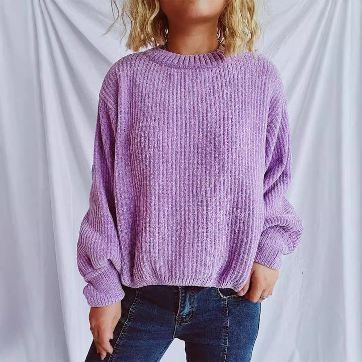 Kvinnens koselige chunky strikkegenser med brede ermer og teksturert design Skjora