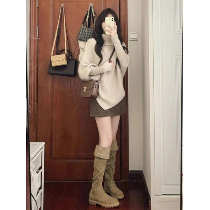Kvinnes oversized genser med asymmetrisk hem Skjora
