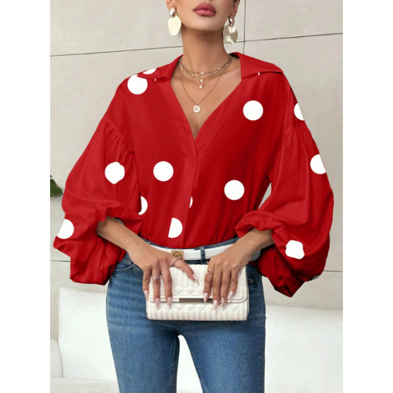 Damebluse med voluminøse ballongermer og elegant krage Skjora