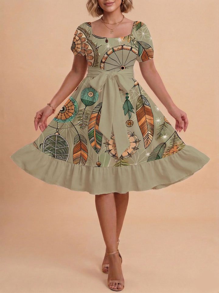 Damen Midikleid mit verspieltem Druck und tailliertem Schnitt Skjora