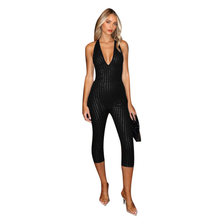 Dame figurvennende Jumpsuit med dyp V-hals og nettaktig design Skjora