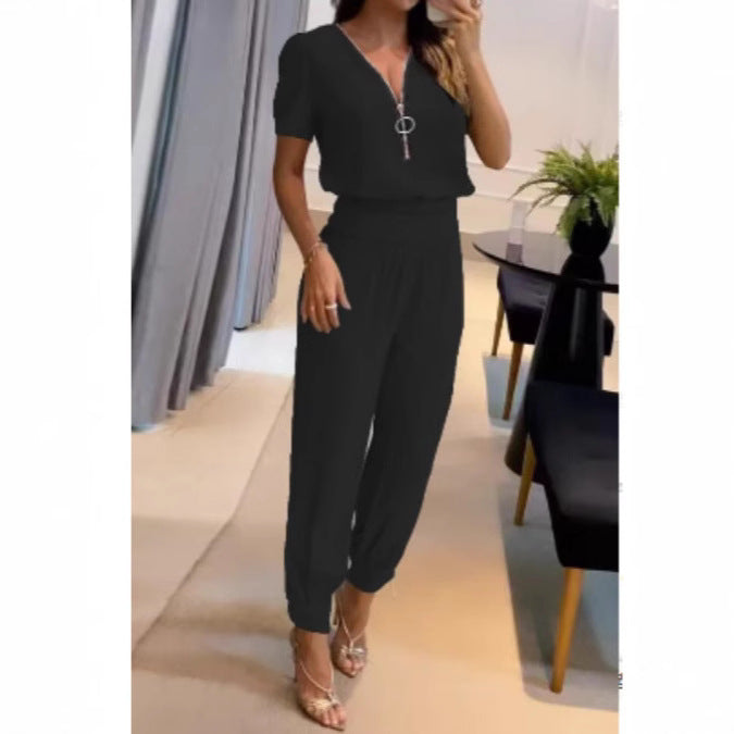 Damer Løs jumpsuit med elegant V-hals og perfekt passform Skjora