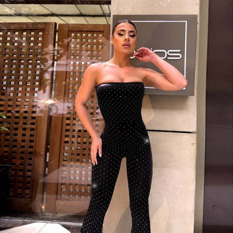Damer skulderfri jumpsuit med elegante paljetter og skospenner Skjora