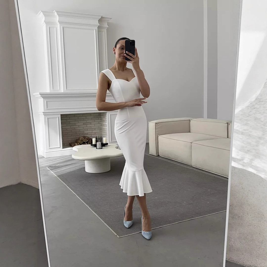 Dame omslagskjole med elegant hjerteutringning og svingende kant Skjora
