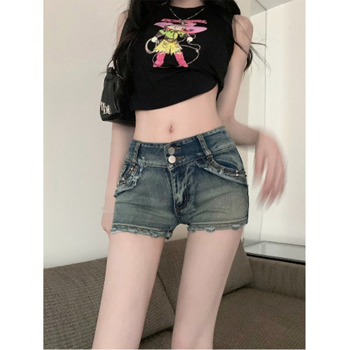 Dame casual denimshorts med kontrasterende detaljer og trendig snitt