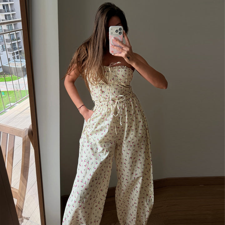 Dame jumpsuit med lekent blomstermønster og elastisk midje snor Skjora