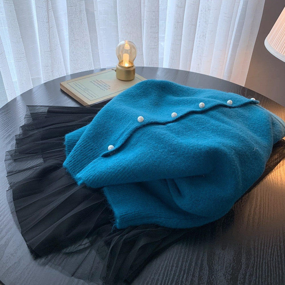 Dame cardigan med elegante perleknapper og moderne design Skjora