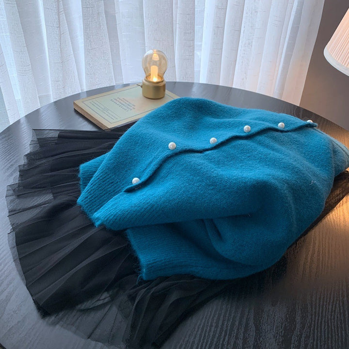Dame cardigan med elegante perleknapper og moderne design Skjora