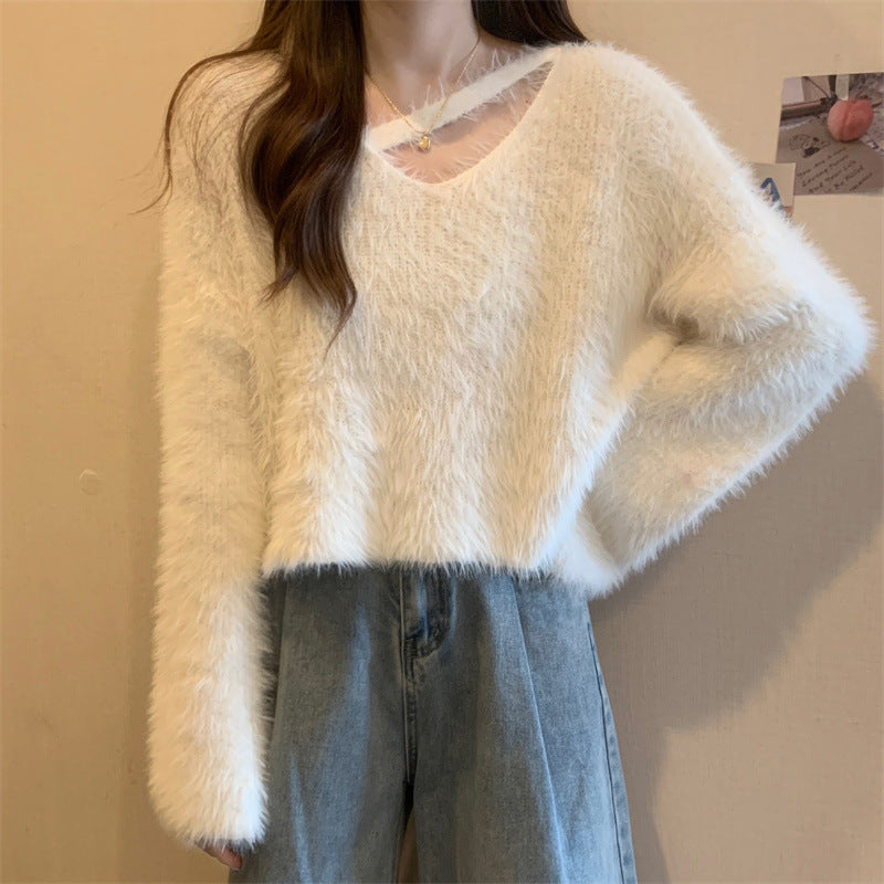 Kvinne Fluffy Genser med Casual Snitt og Dyp V-Hals Skjora
