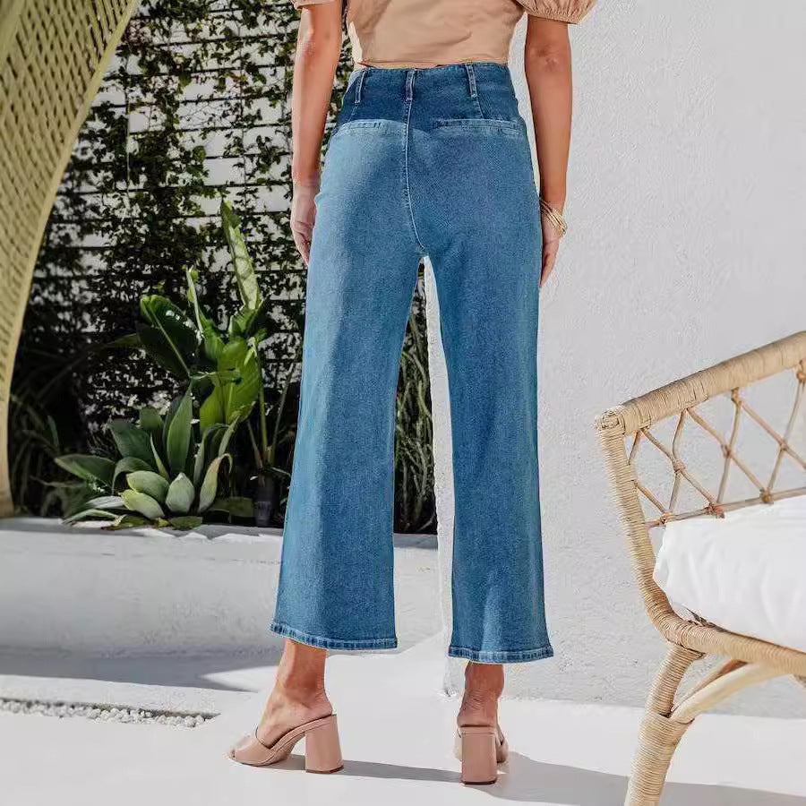 Damer høyhalsa jeans med knapppreget og vid ben Skjora