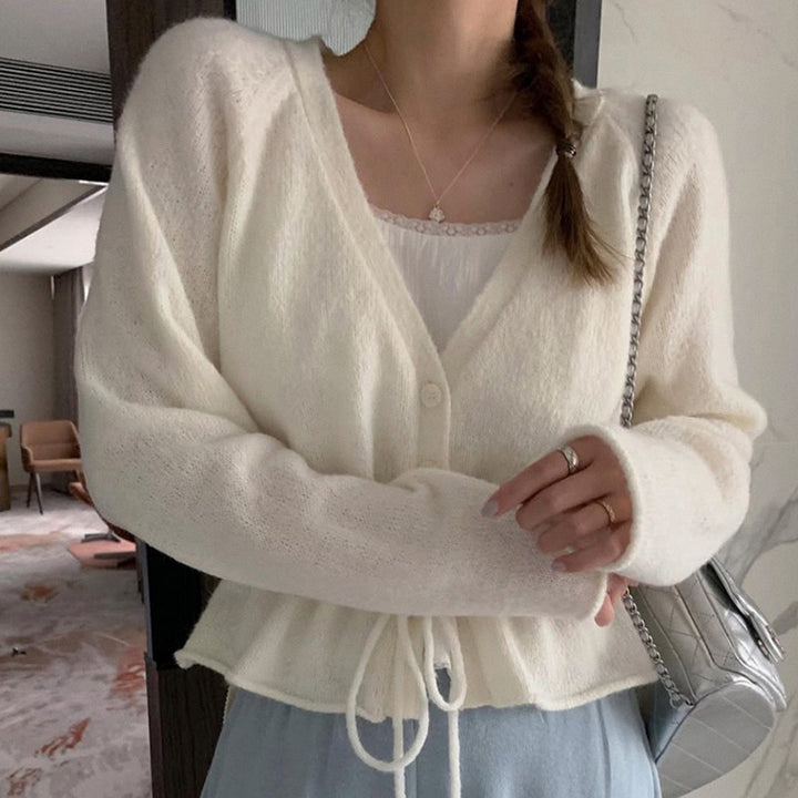 Dame cardigan med justerbart belte og luftige ermer Skjora