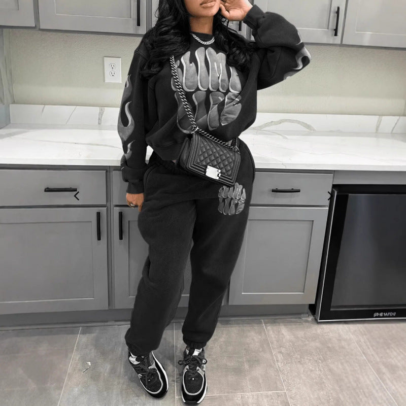 Kvinne tracksuit med trendy grafisk design og sporty passform Skjora