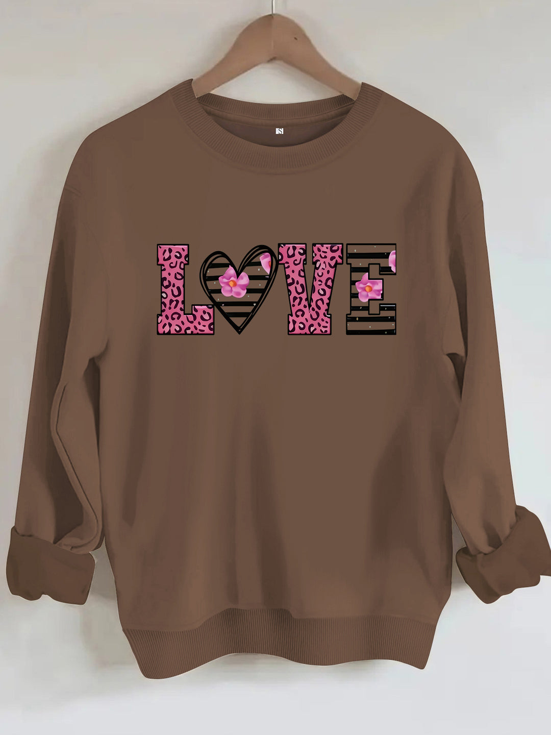 Dame sweatshirt med moderne leopard hjerte-design og behagelig passform Skjora