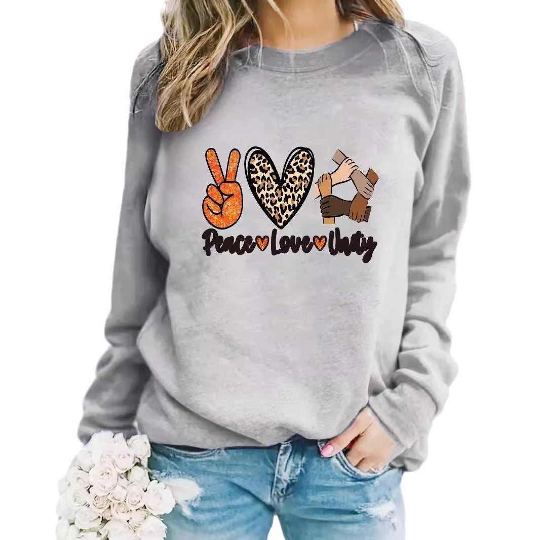 Kvinnegenser med kreativt Peace, Love & Unity-design Skjora