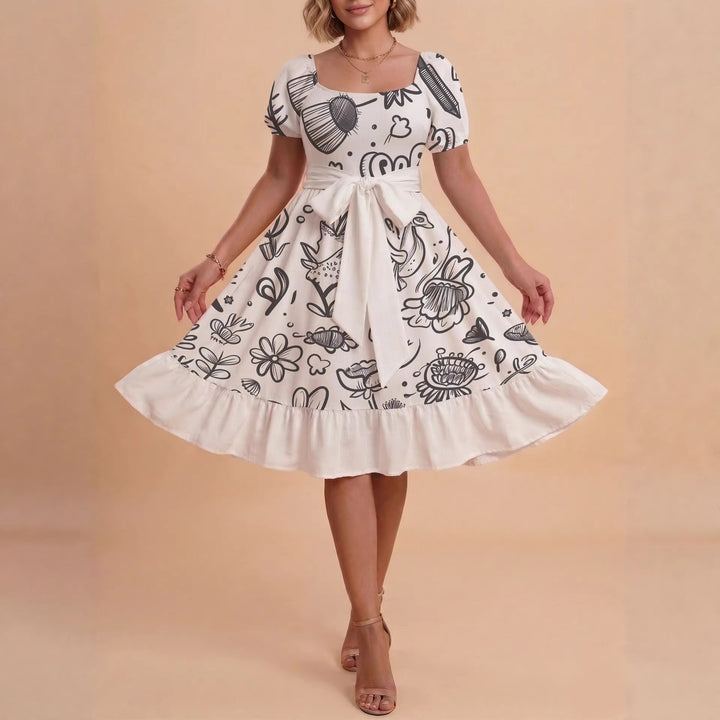 Dame Midi kjole med elegant blomstertrykk og belte i midjen Skjora