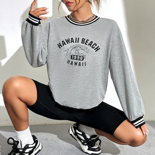 Dame avslappet sweatshirt med trykt Hawaii-motiv og senkede skuldre Skjora