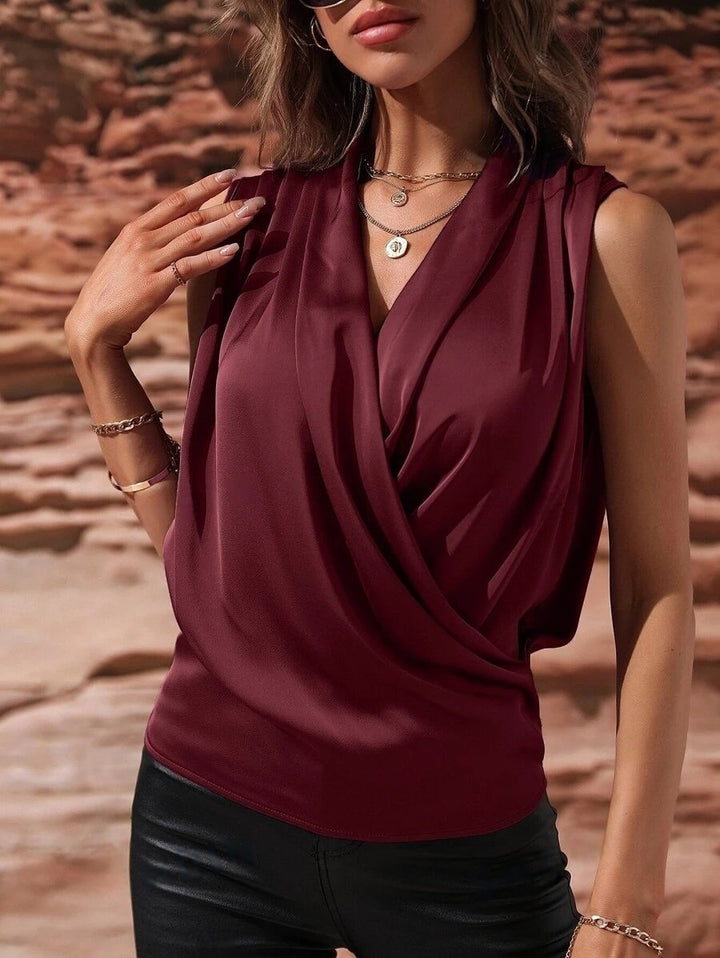 Damer Elegant topp med omslagseffekt og drapering Skjora