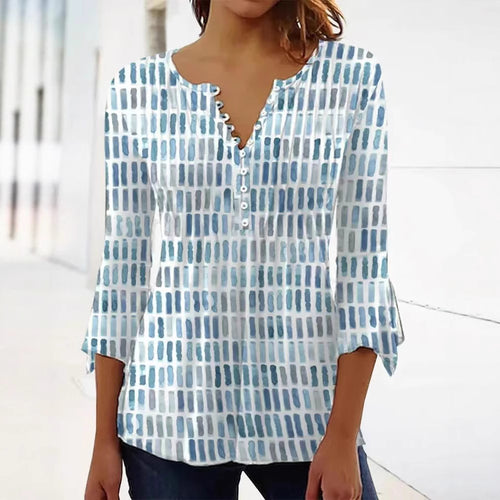 Damebluse i moderne grafisk design med knappe detaljer Skjora
