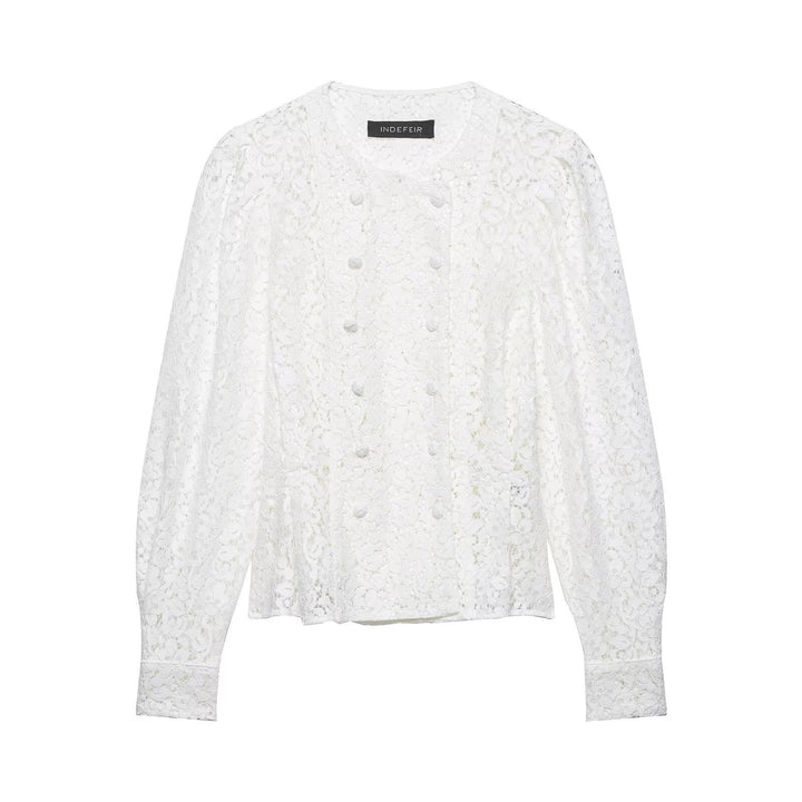 Dame spissbluse med dekorative knapper og elegant passform Skjora