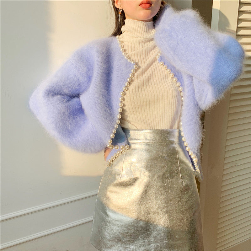 Kvinnens fluffy cardigan med perlekant og trendysnitt Skjora