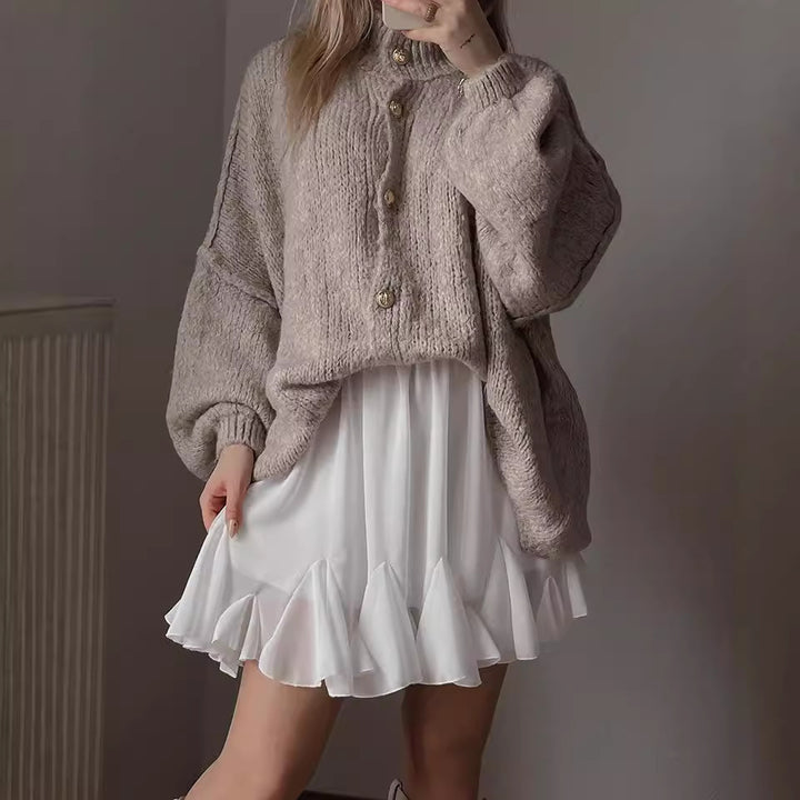 Kvinnenes koselige oversized strikkegenser med moderne snitt og voluminøse ermer Skjora