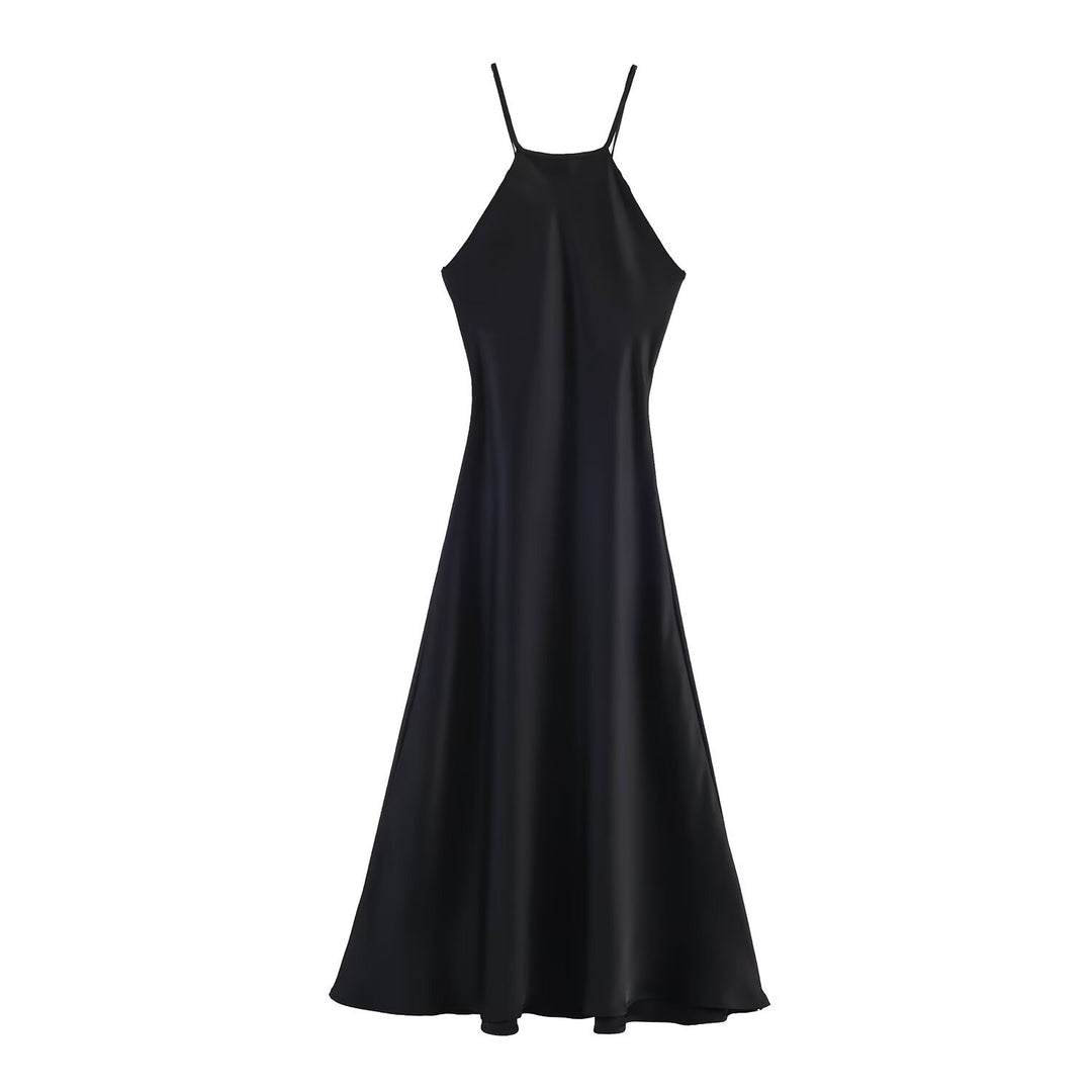 Dame maxikjole med elegant halterneck og svingende kant Skjora