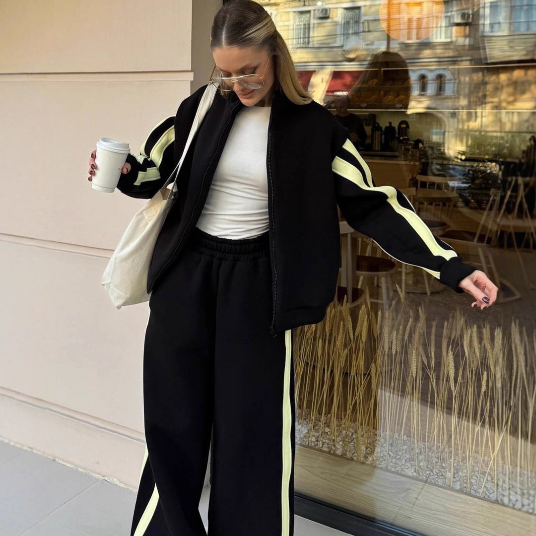 Dames sportieve fleece jacket en losse broek combinatie Skjora