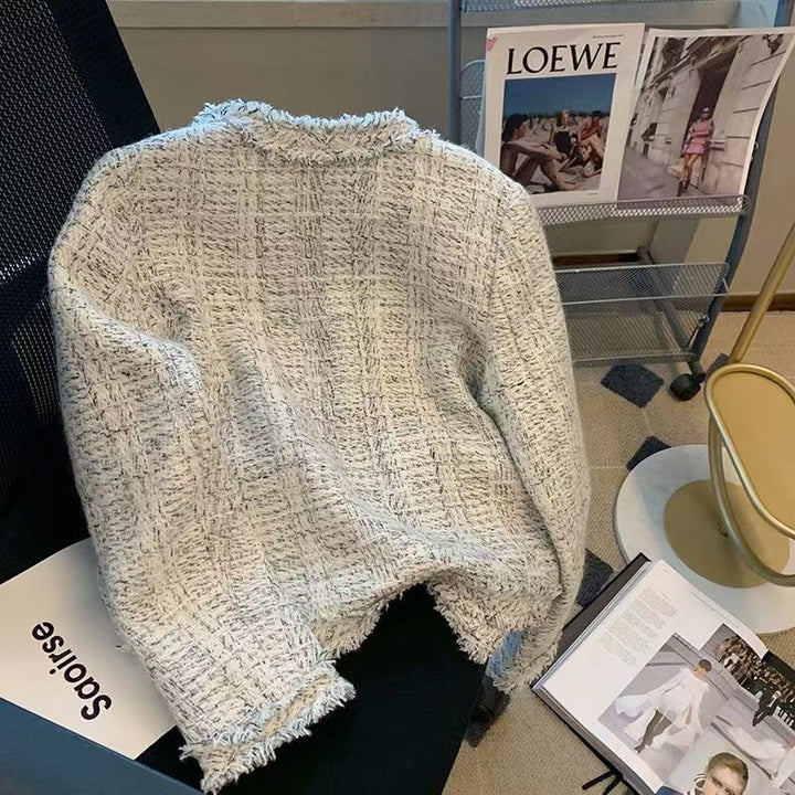 Kvinnenes elegante tweedjakke med gullknapper Skjora