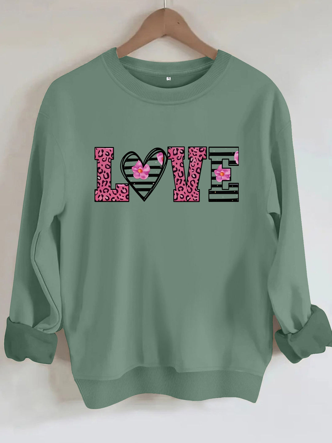 Dame sweatshirt med moderne leopard hjerte-design og behagelig passform Skjora