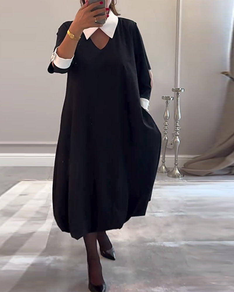 Kvinnes oversized skjortekjole med V-hals og elegant kragestruktur Skjora