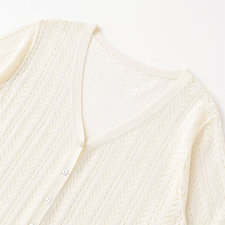 Dame strikket crop-top med V-hals og knapplukking Skjora