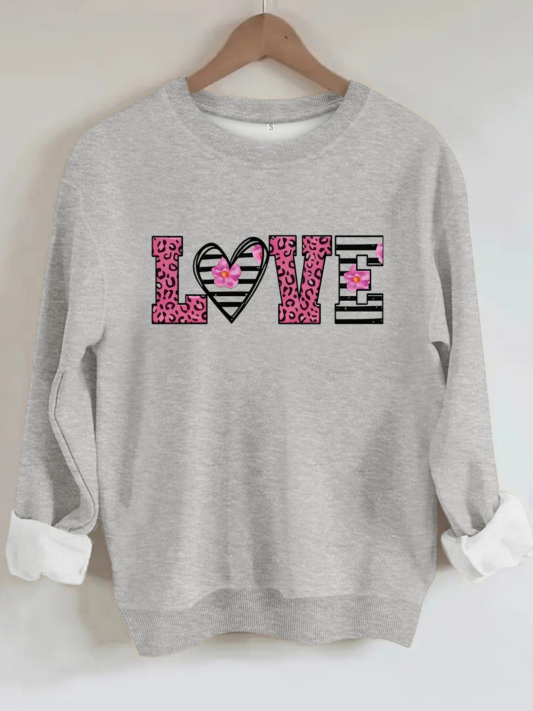 Dame sweatshirt med moderne leopard hjerte-design og behagelig passform Skjora