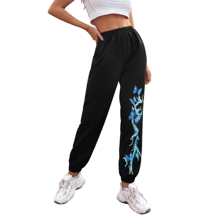 Kvinnecasual joggebukser med fargerik sommerfugl- og lyn-design Skjora