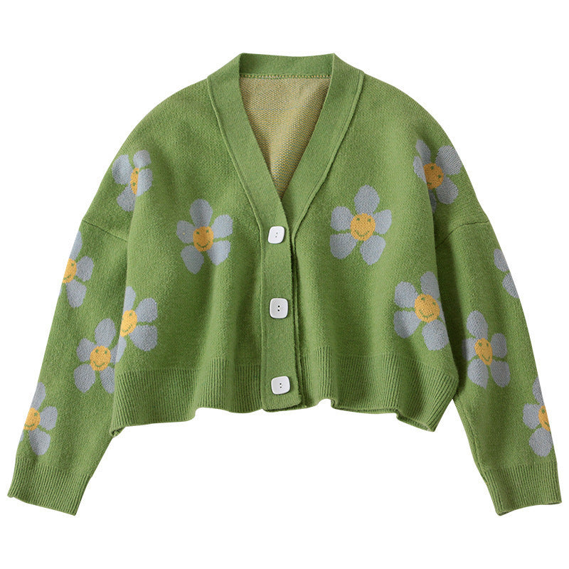 Kvinnes chunky strikk cardigan med blomstermønster og knappedetaljer Skjora