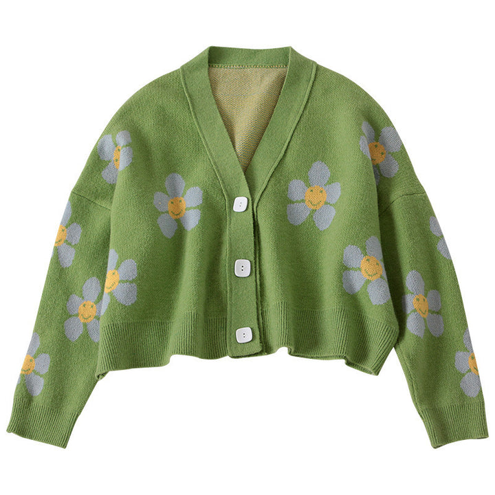 Kvinnes chunky strikk cardigan med blomstermønster og knappedetaljer Skjora