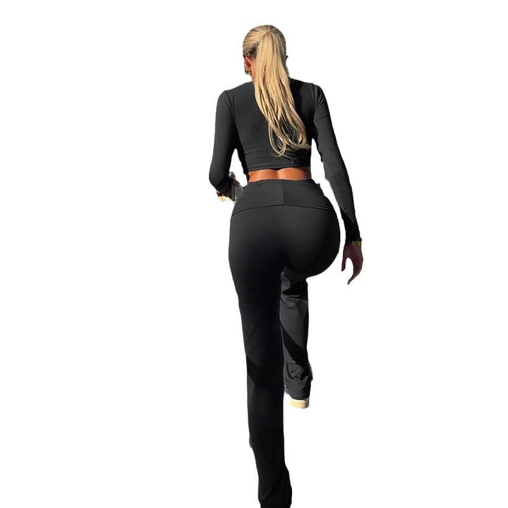 Dame Sporty Langarm-Crop-Top og figurnær Flared-Bukse Sett Skjora