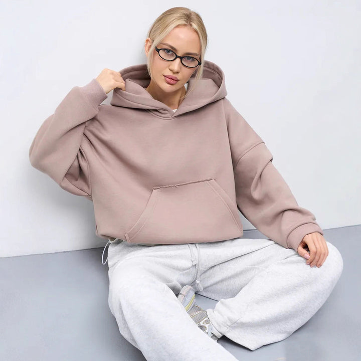 Dame oversized hettegenser med sidelommer og avslappet passform Skjora