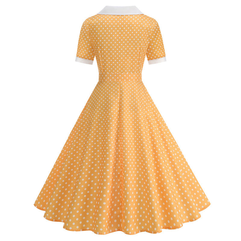 Dame Vintage Polka-Dot Kjole med knappdetaljer og svajende skjørt Skjora