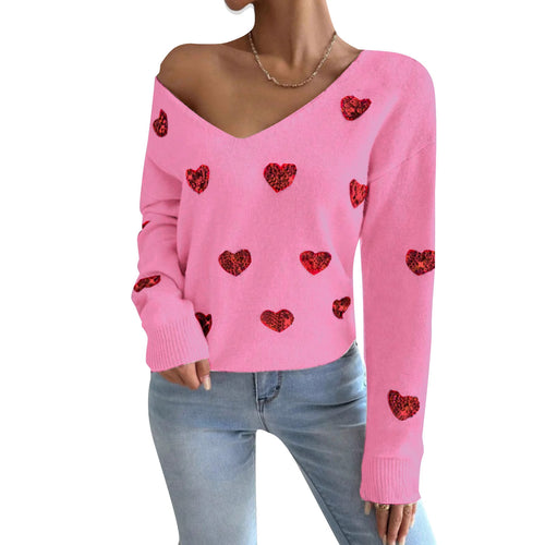 Kvinnelig oversized genser med dyp V-hals og hjerte motiver Skjora
