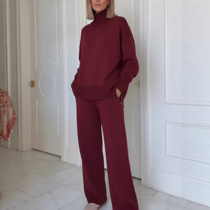 Kvinnelig komfortabel strikket loungewear-sett med høye halsgenser og vide bukser Skjora