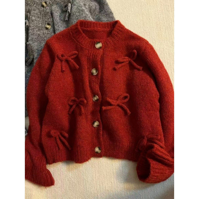 Dame cardigan med dekorative sløyfer på