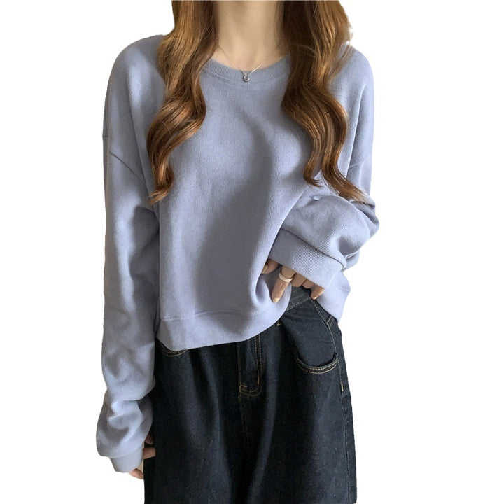 Kvinne casual cropped genser laget av myk bomullsblanding med stilren rund hals Skjora