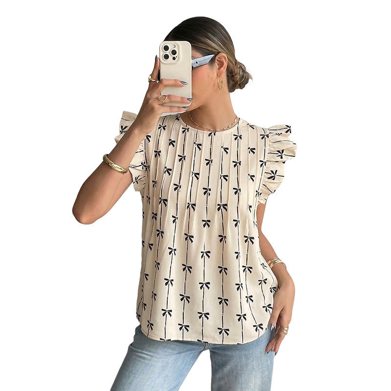 Damer bluse med rysjer, blomstertrykk og luftig snitt Skjora