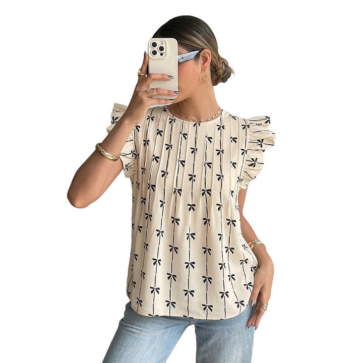 Damer bluse med rysjer, blomstertrykk og luftig snitt Skjora