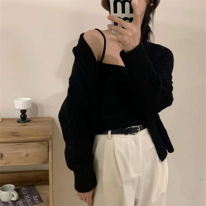 Dame cardigan i kabelstrikkdesign med knappestolpe og elegant passform Skjora