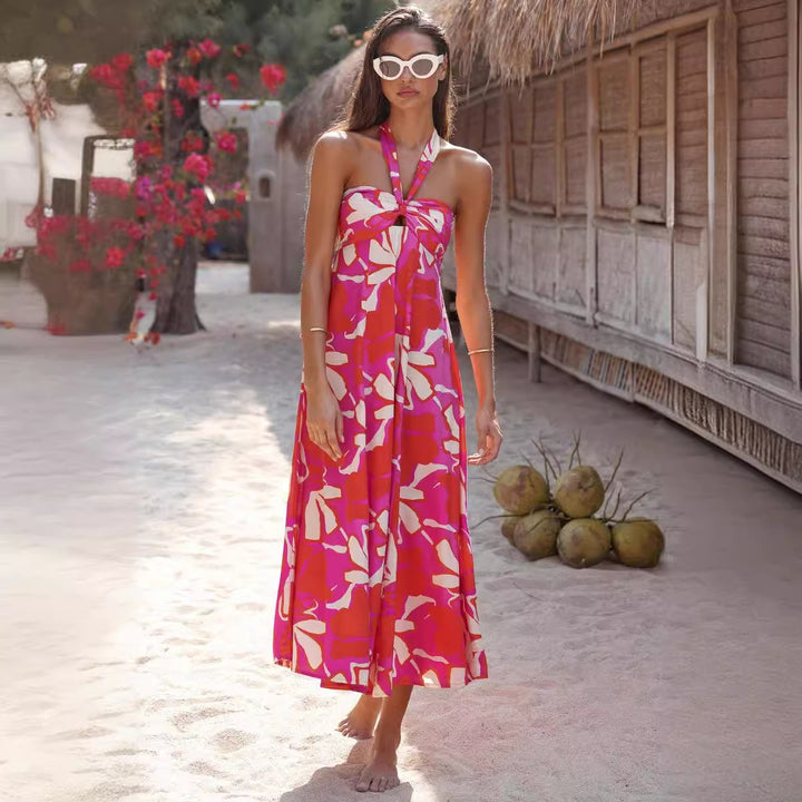Kvinne maxi kjole med blomster bandeau design og elegant utsvingt skjørt